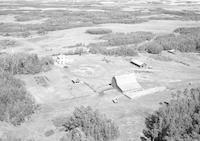 Aerial photograph of a farm in Saskatchewan (10-49-19-W3)